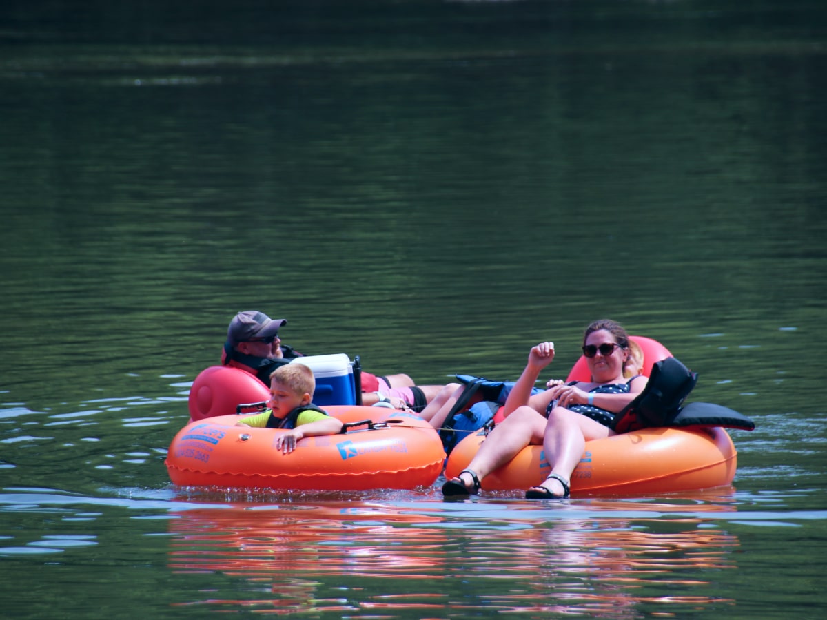 family of three tubing on the shenandoah river