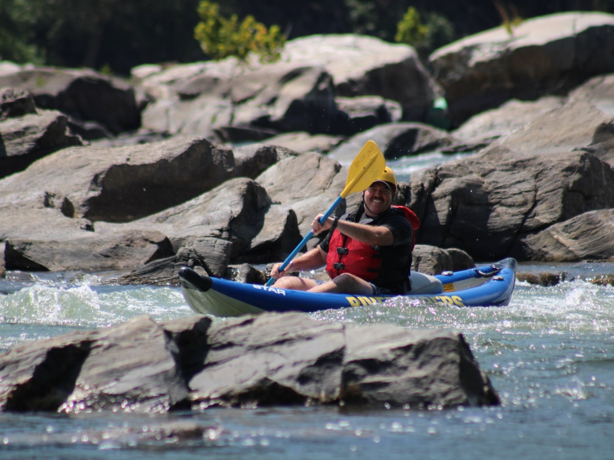 male on inflatable kayak on the Potomac river