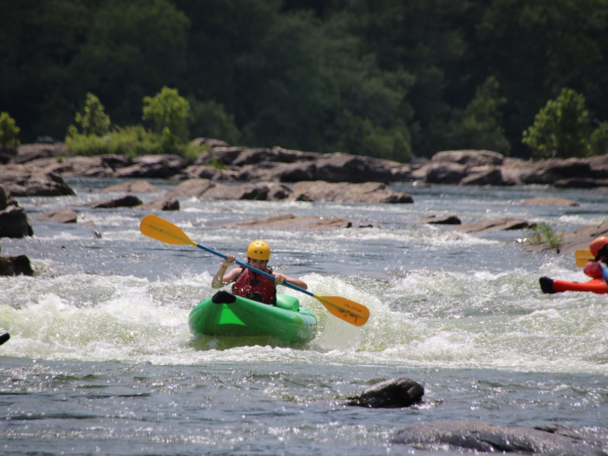 female on inflatable kayak on the Potomac river