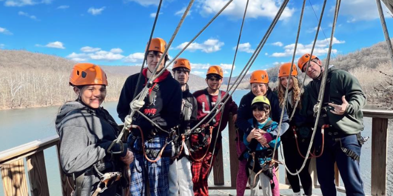 family ziplining with river riders